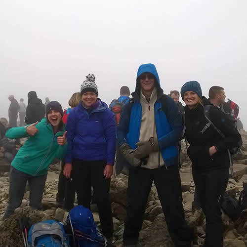 Faith Furniture Company's Ian Wilkes at the top of Ben Nevis