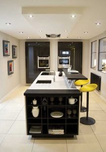 Siematic S2 kitchen in sterling grey and Siematic SC cabinets in graphite