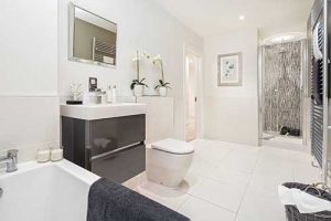 A typical CALA Homes bathroom/en suite featuring products from Lauren, Utopia, Vado and Roman