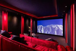 Home cinema. Large screen, sound system and cinema seating
