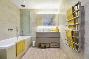 Practicality: a multifunctional bathroom with Bette Ocean inset bath and Merlyn bath screen
