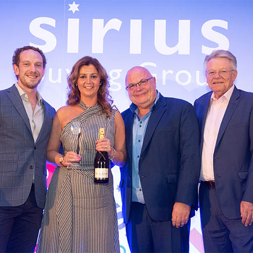 SyriusawardWEBLeft to right - Steve Jones, Sirius, Sharon Hamer, Field Sales Director - independents, from Hoover Candy and Peter Gilks and Gordon Jones, Sirius