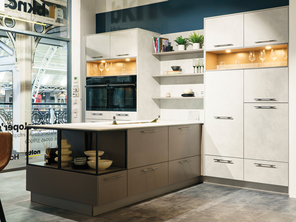 This Nolte kitchen is shown in Light Concrete with Haier appliances and a Trough worktop accessory from The 1810 Company